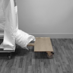 Wheeled base for negative-pressure air-purifying system.