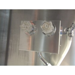 Portable aluminium decontamination shower for asbestos abatement workers (34 x 30 x 83 inches).