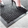 Chevron entrance carpet, 5/16 in made of charcoal gray polypropylene.