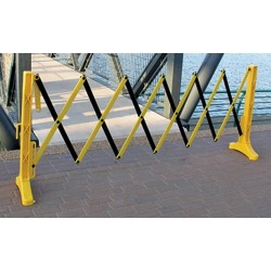 Barrière de sécurité extensible, 11 1/2 pieds (3,5 m), en polypropylène jaune et noir.