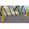 Barrière de sécurité extensible, 11 1/2 pieds (3,5 m), en polypropylène jaune et noir.